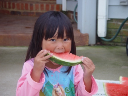 Kasen enjoying watermelon